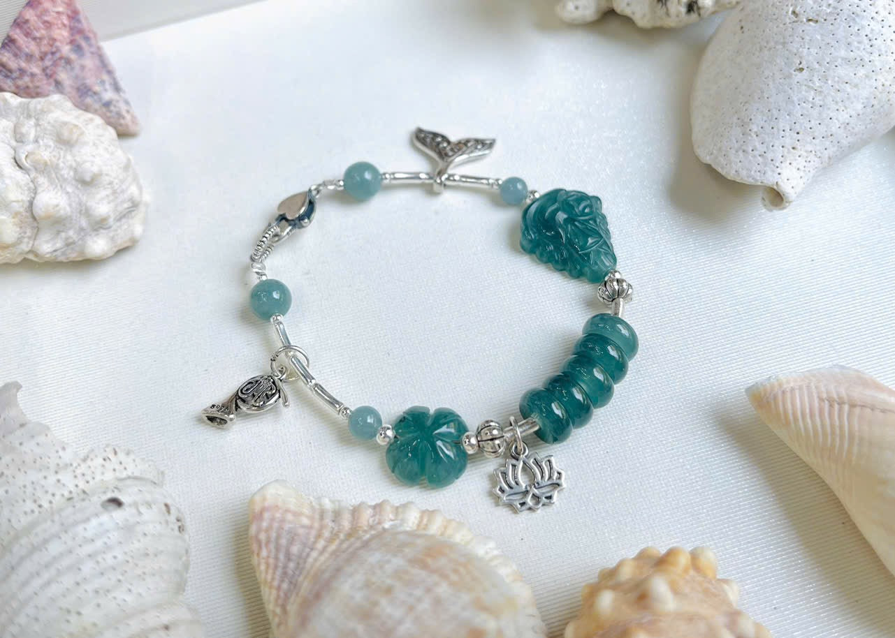 Vòng tay charm lam ngọc mix bạc Thái
